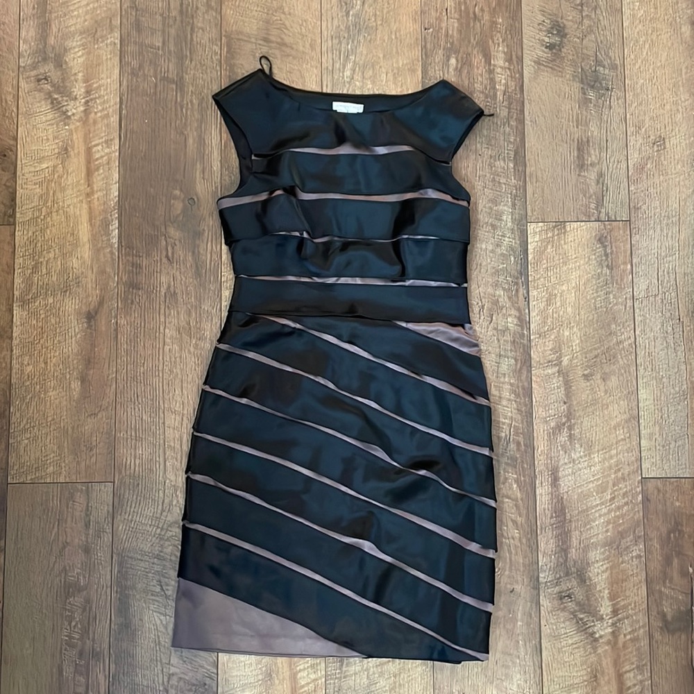 Black and bronze mark bandage strap sheath dress.